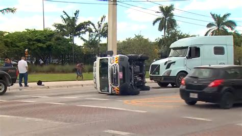 No injuries following rollover wreck involving ambulance in NW Miami-Dade